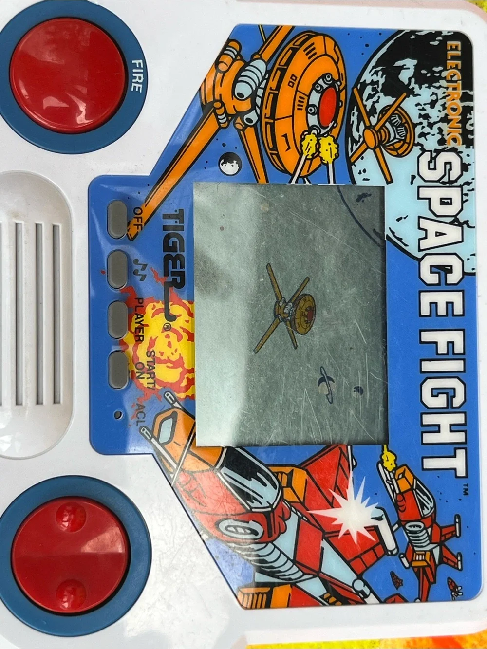 Tiger Space Fight vintage 1988 Handheld Electronic Game - White and Blue